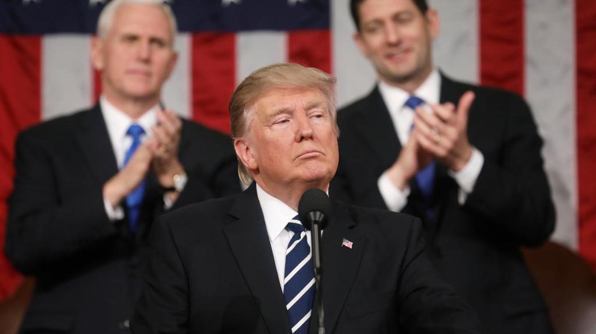 President Donald Trump addresses a joint session of Congress on Capitol Hill in Washington, Tuesday, Feb. 28, 2017, as Vice President Mike Pence and House Speaker Paul Ryan, R-Wis., applaud.