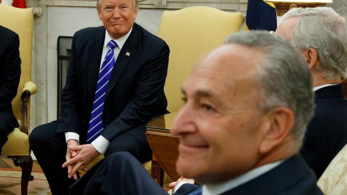President Donald Trump meets with Senate Minority Leader Chuck Schumer, D-N.Y., and other congressional leaders in the Oval Office Sept. 6.