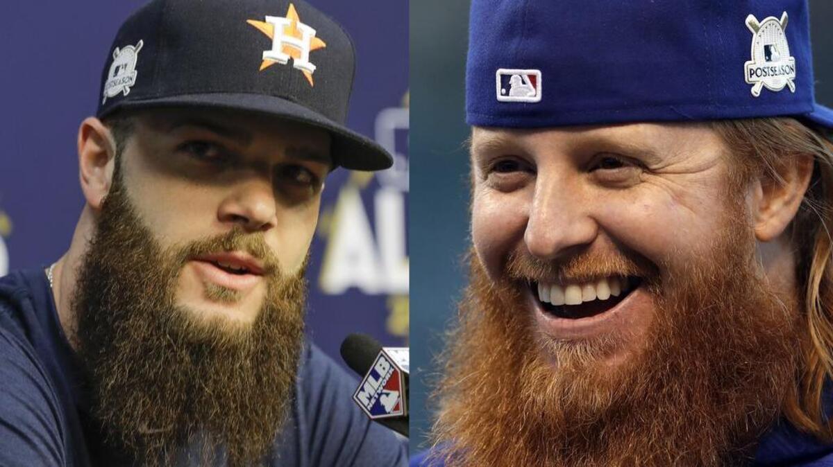 Houston Astros starting pitcher Dallas Keuchel (left) battles Los Angeles Dodgers third baseman Justin Turner in the 2017 World Series Battle of the Beards.