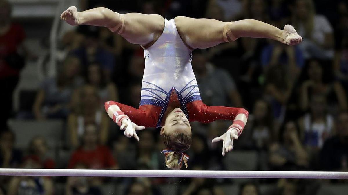 Ashton Locklear competes on the uneven bars during the women's U.S. Olympic gymnastics trials in San Jose, Calif., Sunday, July 10, 2016.