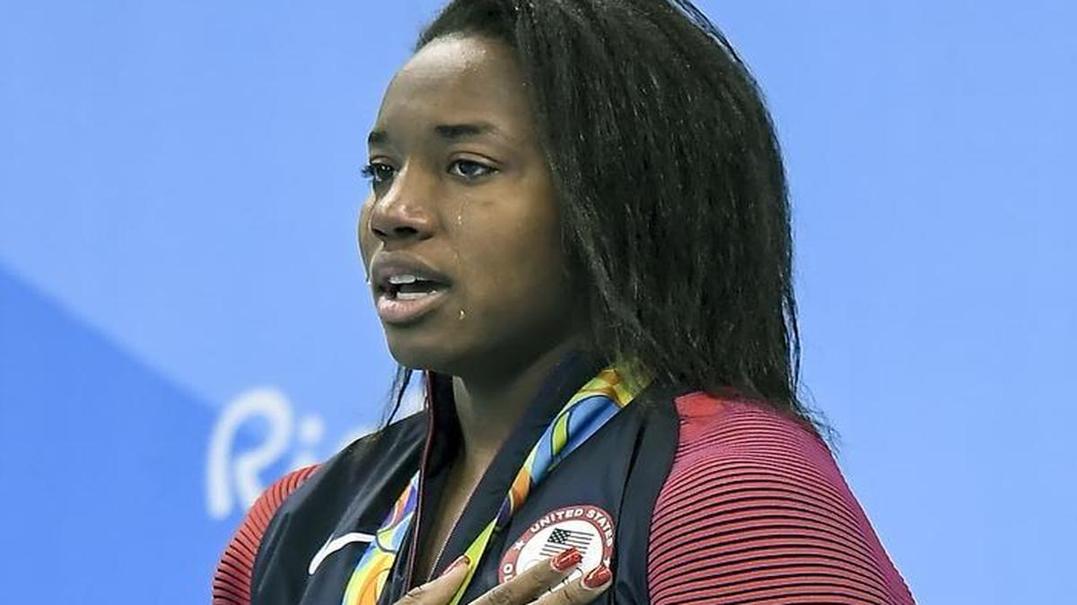 United States swimmer Simone Manuel cried during the national anthem after tying for a gold medal in the women’s 100-meter freestyle on Thursday at the Summer Olympics in Rio de Janeiro.