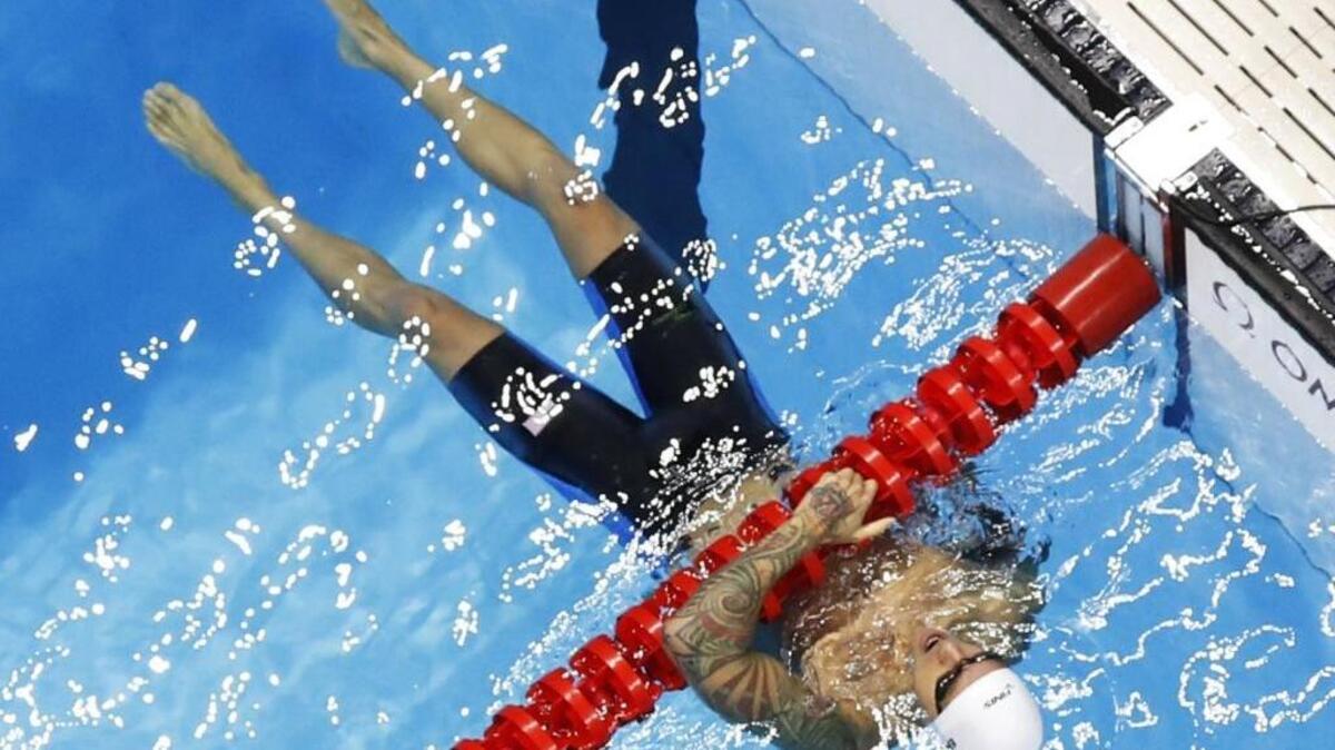 Anthony Ervin rests after competing in a heat of the 4x100m freestyle relay on Saturday in Rio de Janeiro, Brazil. Ervin was not selected to swim in the final despite faster times than another swimmer, but he made the best of the situation.