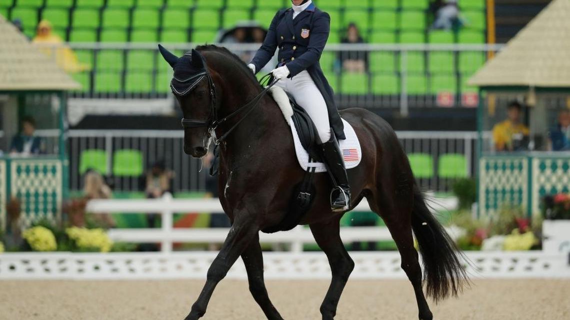 American Kasey Perry-Glass, riding Dublet, competes in the equestrian dressage competition on Wednesday.