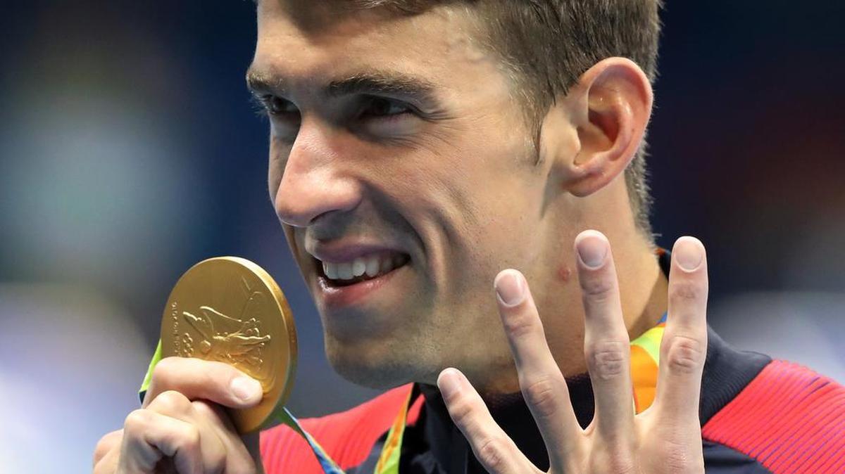 United States’ Michael Phelps celebrates winning the gold medal in the men’s 200-meter individual medley during the swimming competitions at the 2016 Summer Olympics on Thursday in Rio de Janeiro, Brazil.