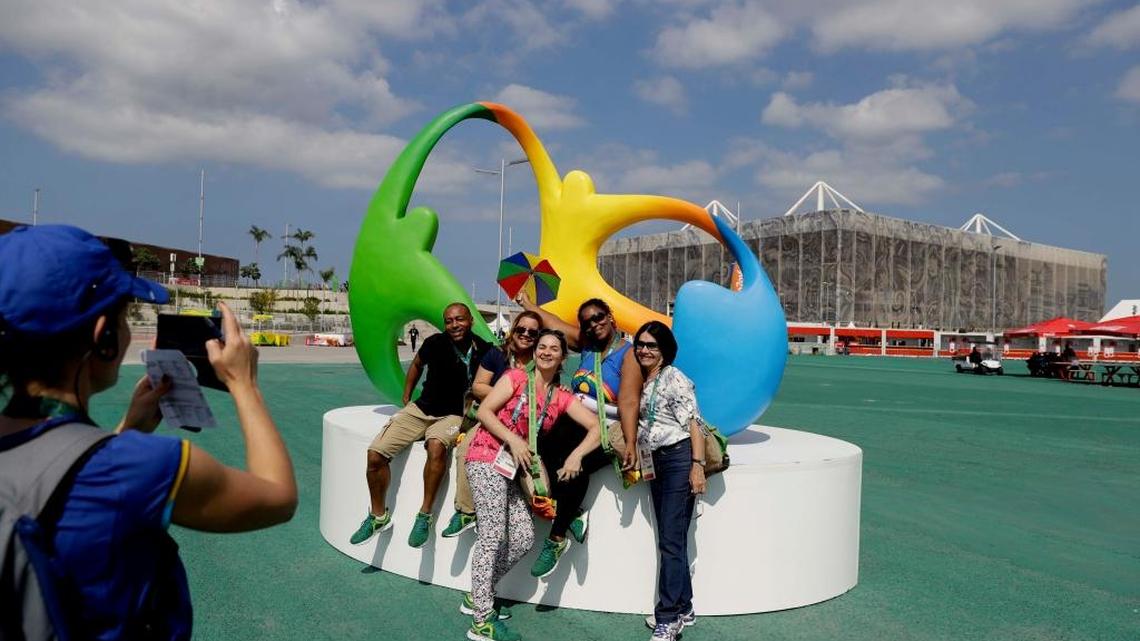 Volunteers pose for a picture at the Olympic Park in Rio de Janeiro on Thursday as Brazil prepares to host the 2016 Summer Olympics. The Opening Ceremonies are Friday night at Maracana Stadium.