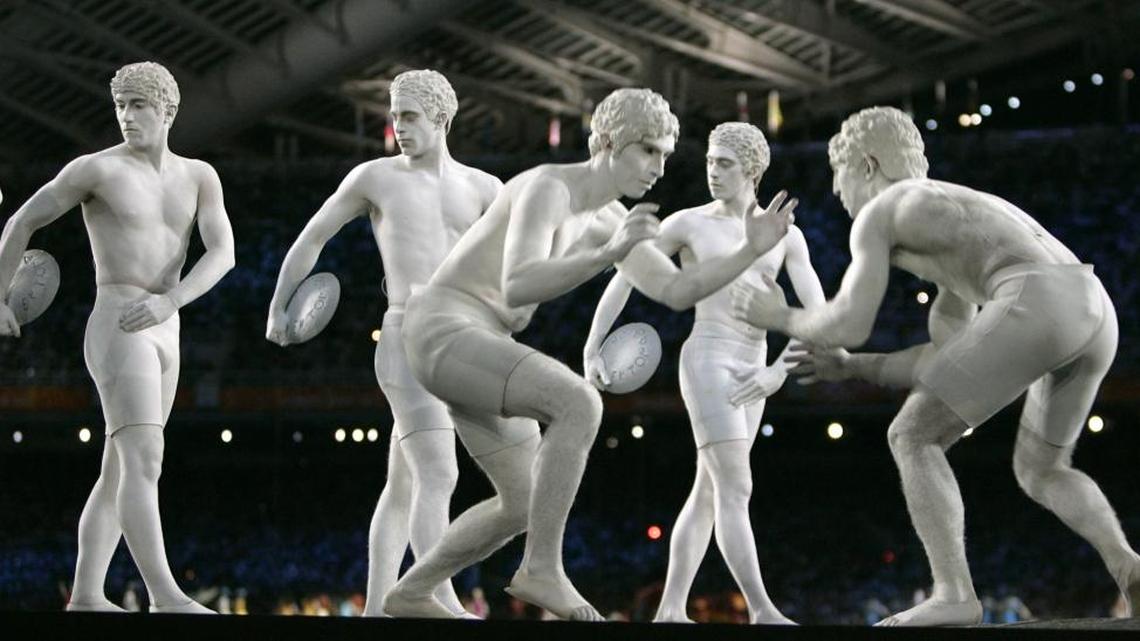 Performers dressed as ancient Greek athletes pose during the Opening Ceremonies of the 2004 Olympic Games in Athens on Aug. 13, 2004.