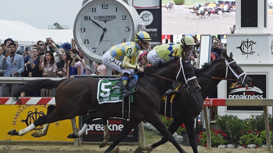 Cloud Computing (2), ridden by Javier Castellano, wins142nd Preakness Stakes horse race at Pimlico race course as Classic Empire with Julien Leparoux aboard takes second, Saturday, May 20, 2017, in Baltimore. (