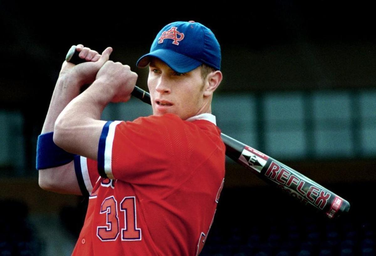 Josh Hamilton holds a bat at Athens Drive High School, where he was considered one of the best baseball prospects in the country.