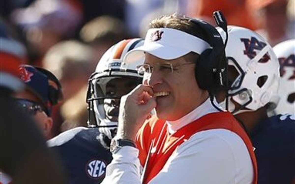 Auburn head coach Gus Malzahn waits for the replay official on a fumble loss to Georgia during the second half of an NCAA football game, Saturday, Nov. 14, 2015, in Auburn, Ala. Georgia won 20-13.