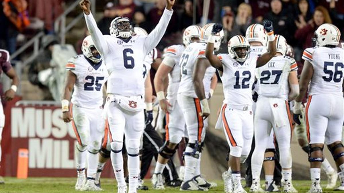 Auburn quarterback Jeremy Johnson (6) celebrates a first down near the end of the third quarter of a NCAA college football game on Saturday, Nov. 7, 2015 at Kyle Field in College Station, Texas. Auburn won 26-10.