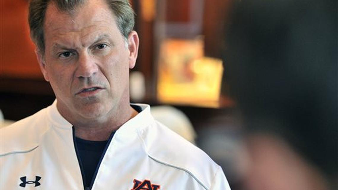 In this Wednesday, April 8, 2015 photo, Auburn linebackers coach Lance Thompson talks to reporters at the Auburn Athletic Complex in Auburn, Ala. Auburn linebackers coach Lance Thompson is still chummy with some of his former colleagues at rival Alabama. He also speaks well of his old boss, Crimson Tide coach Nick Saban, he just hasn’t spoken to him. (Julie Bennett/AL.com via AP) MAGS OUT; MANDATORY CREDIT