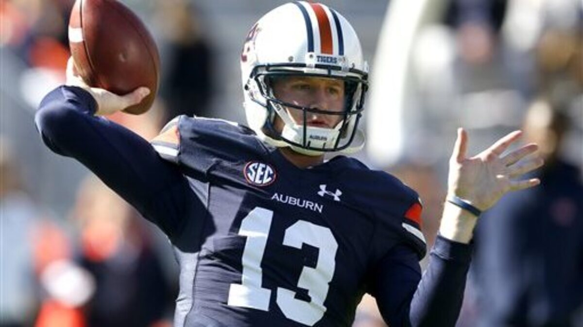 Auburn quarterback Sean White (13) throws a pass during warmups before an NCAA football game against Georgia, Saturday, Nov. 14, 2015, in Auburn, Ala.