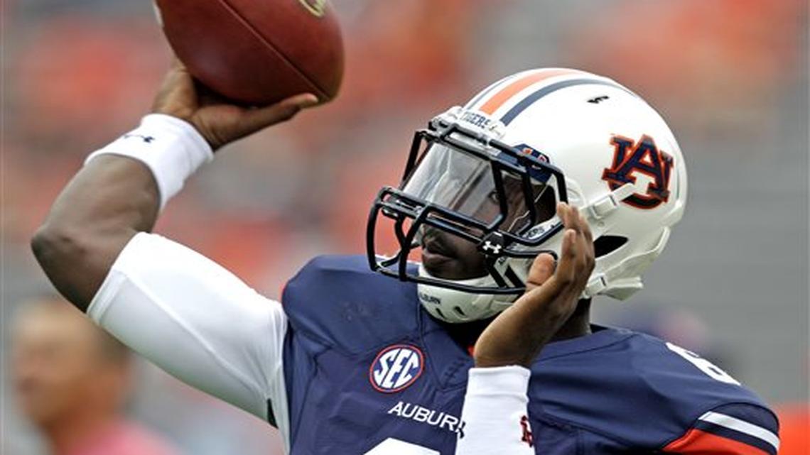 Auburn quarterback Jeremy Johnson (6) warms up before the first half of an NCAA college football game against Jacksonville State, Saturday, Sept. 12, 2015, in Auburn, Ala.