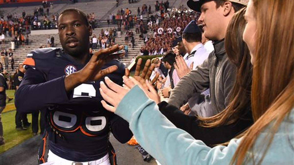 Auburn quarterback Jeremy Johnson celebrates Auburn's 56-34 victory over Idaho in an NCAA football game, Saturday, Nov. 21, 2015, in Auburn, Ala.